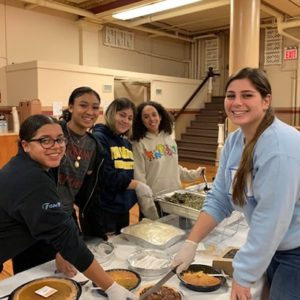 college students gathered at Assumption of the Blessed Virgin Mary to celebrate Thanksgiving.