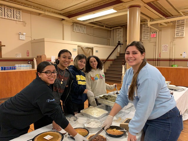 Area college students gathered at Assumption of the Blessed Virgin Mary to celebrate Thanksgiving.