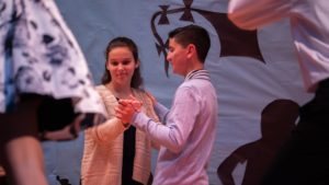 Students in ballroom dancing at St. Rose of Lima Catholic Academy